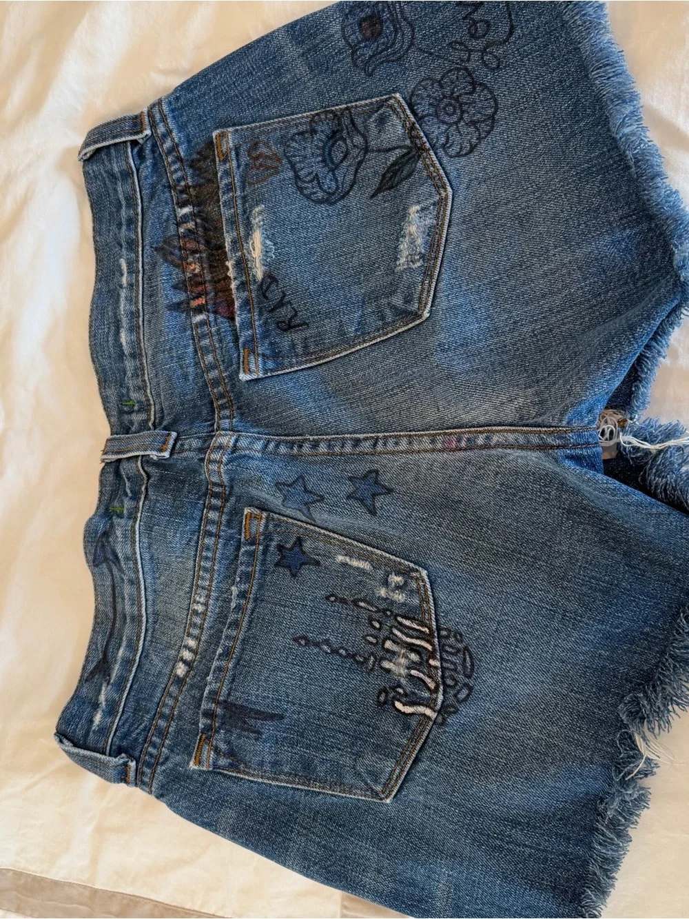 J Brand Distressed Blue Denim Shorts with Printed Graphics